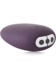 Vibrador clitorial Je Joue Mimi en morado, con sus tres botones de control en un extremo
