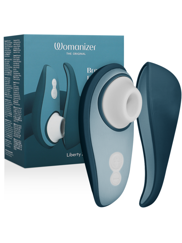 Womanizer Liberty 2 en azul con su tapa magnética y la caja: succionador de clítoris compacto con boquilla blanca