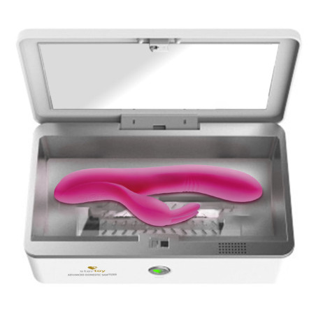 Esterilizador ultravioleta Stertoy abierto, con un vibrador rosa colocado dentro de la cámara