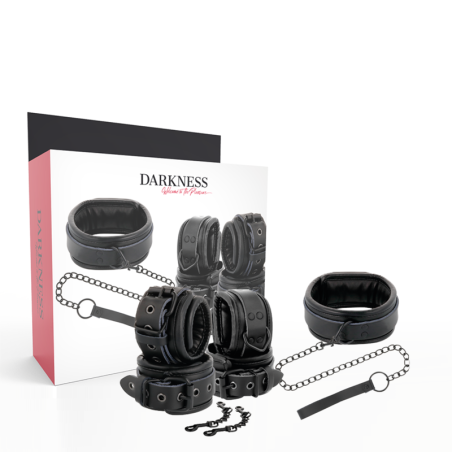 Set bondage Darkness de cuero negro con su caja: collar, correa de cadena, puños y mosquetones