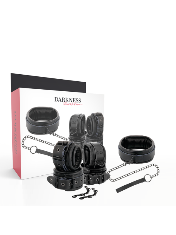 Set bondage Darkness de cuero negro con su caja: collar, correa de cadena, puños y mosquetones