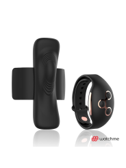 Vibrador de braga Anne's Desire Panty Pleasure en silicona negra junto al reloj mando WatchMe abrochado