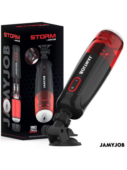 Masturbador automático Jamyjob Storm en negro y rojo junto a su caja, montado sobre un soporte con ventosa