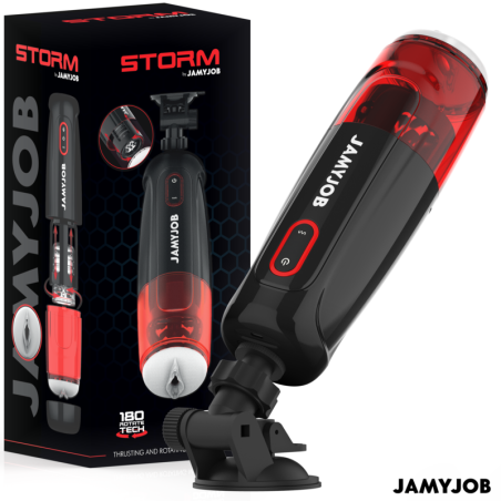 Masturbador automático Jamyjob Storm en negro y rojo junto a su caja, montado sobre un soporte con ventosa
