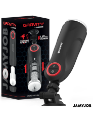 Masturbador automático Jamyjob Gravity negro sobre su soporte de ventosa, junto a la caja del producto