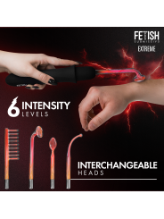 Wand Fetish Submissive aplicado sobre un brazo con el cabezal iluminado; 6 niveles y cabezales intercambiables