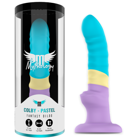Dildo Mythology Colby Pastel tricolor junto a su estuche cilíndrico con las medidas