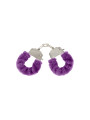 Esposas metálicas forradas de pelo sintético morado incluidas en el kit ToyJoy Super Sex Bomb